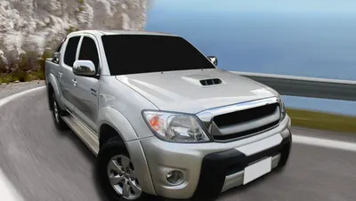 Bumper (Preto/Prata) 06/08 Hilux * — detalhe